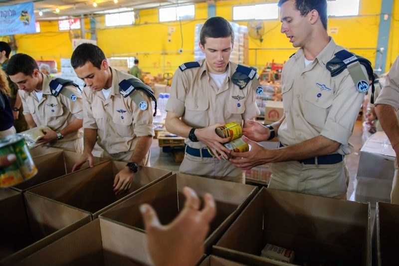 Fighters in food packaging at the logistics center